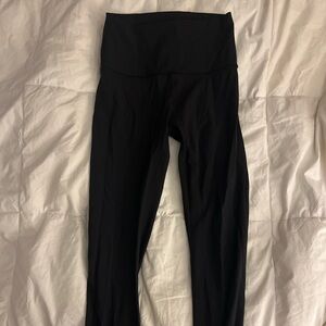 Lululemon black winder under leggings 26”